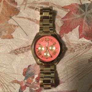 Gold Coral face Fossil watch
